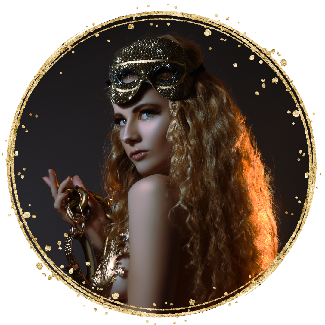 honey-blonde girl with gold mask holding a chain